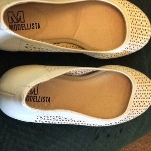 Model list a White Laser Cut Shoes